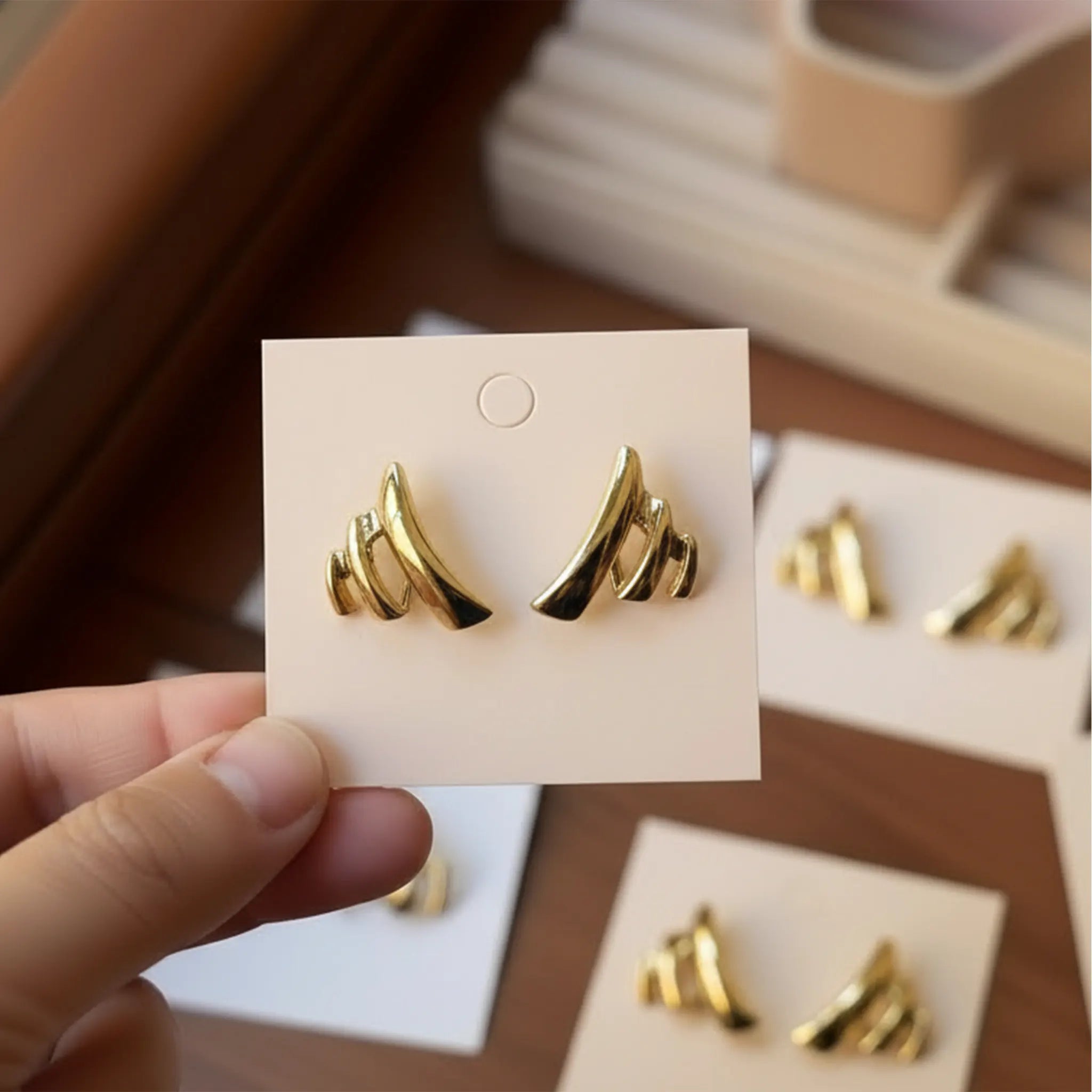 Rushvi Tri Curve Dn Gold Plated Geometric Stud Earrings for Women