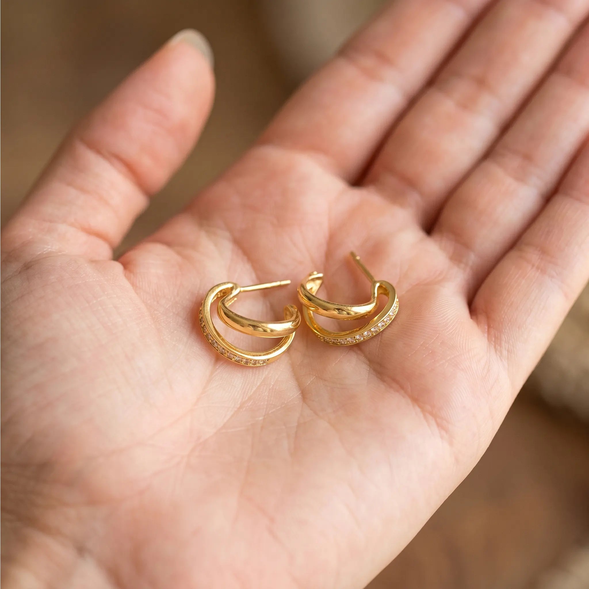 Rushvi Criss Cross Gold Plated CZ Interlocking Huggie Earrings